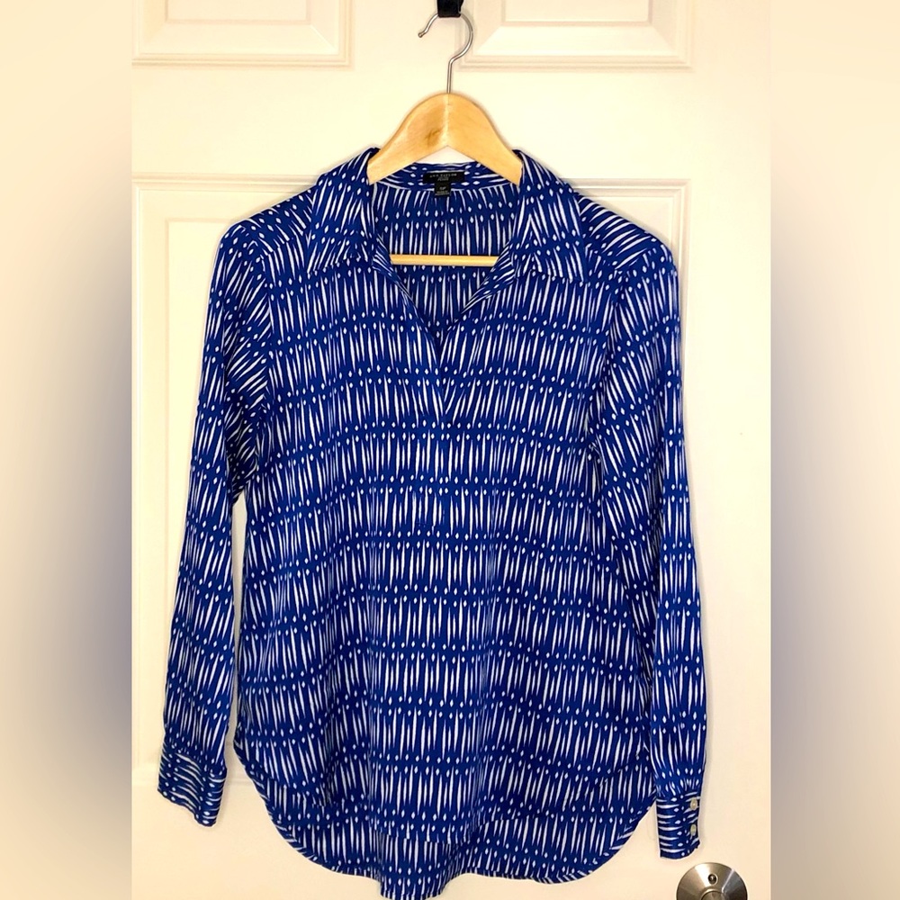 Nautical design can dress up or down. Wrinkle free and easy to go with anything.
